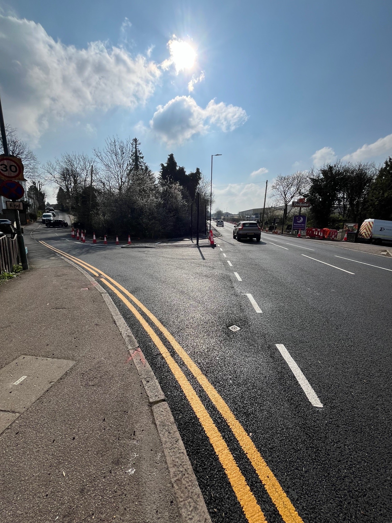 Image showing Cambridge Road improvements following resurfacing and new lining. Image also shows new connection into industrial estate.